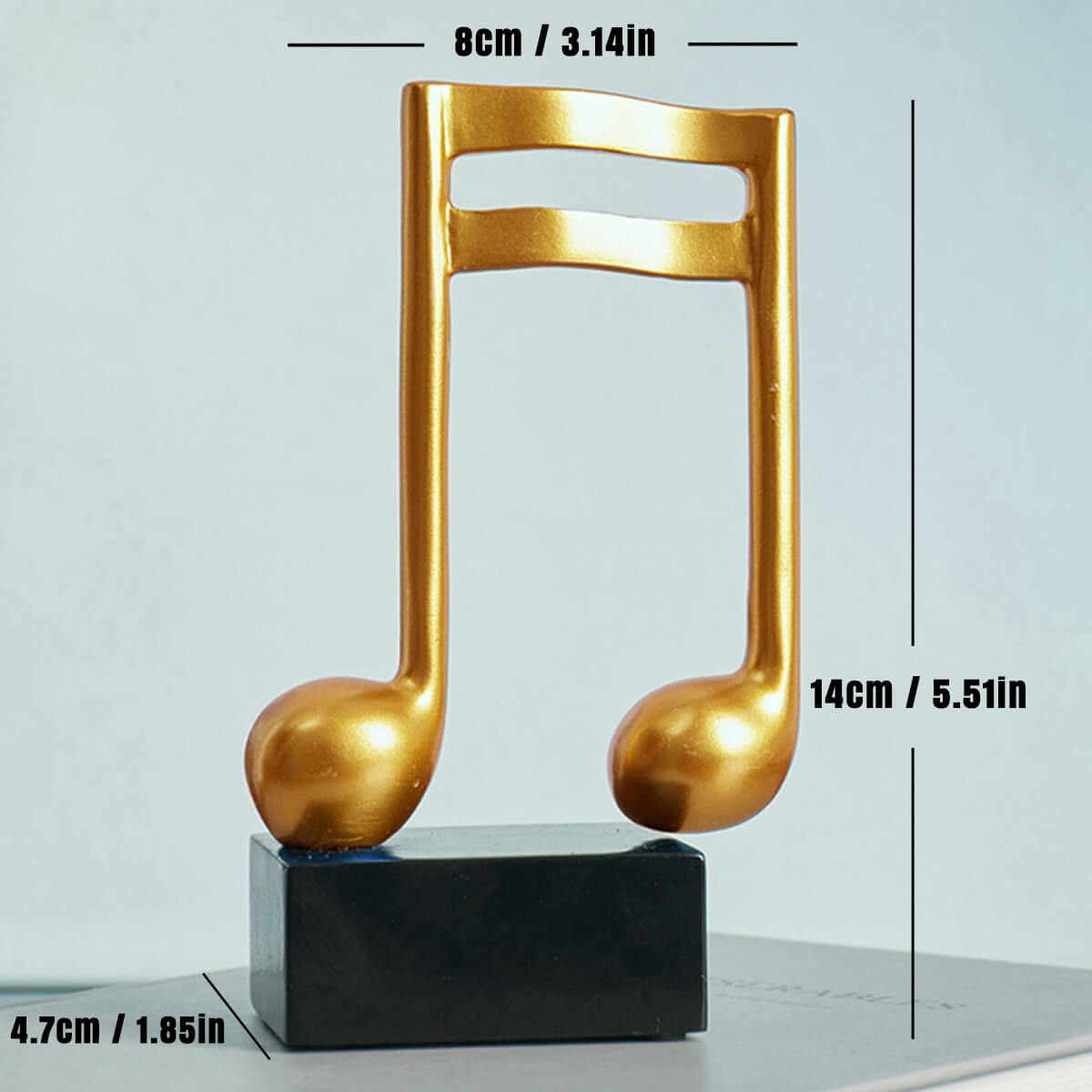 Escultura Decorativa de Nota Musical em Resina Dourada