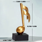Escultura Decorativa de Nota Musical em Resina Dourada